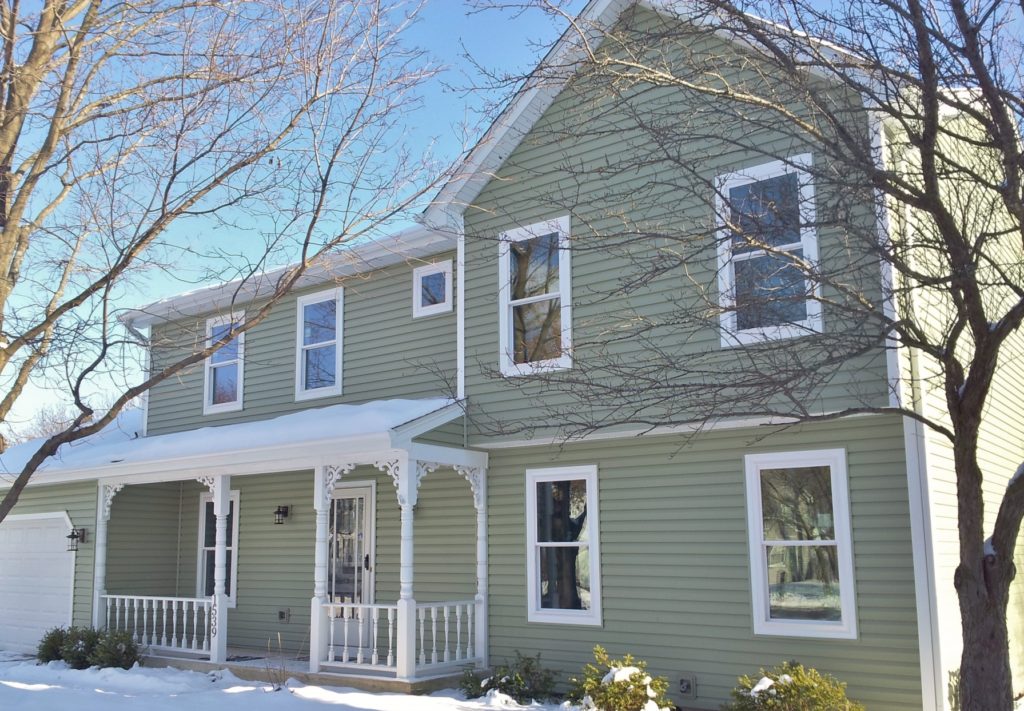Home with new siding and gutters installed in Ankeny Iowa